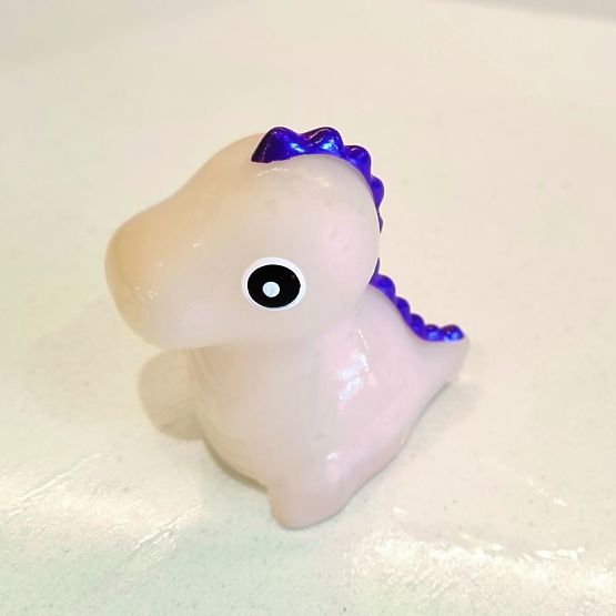 Set knjiga koja mijenja boju s igračkom - Dinosaurus